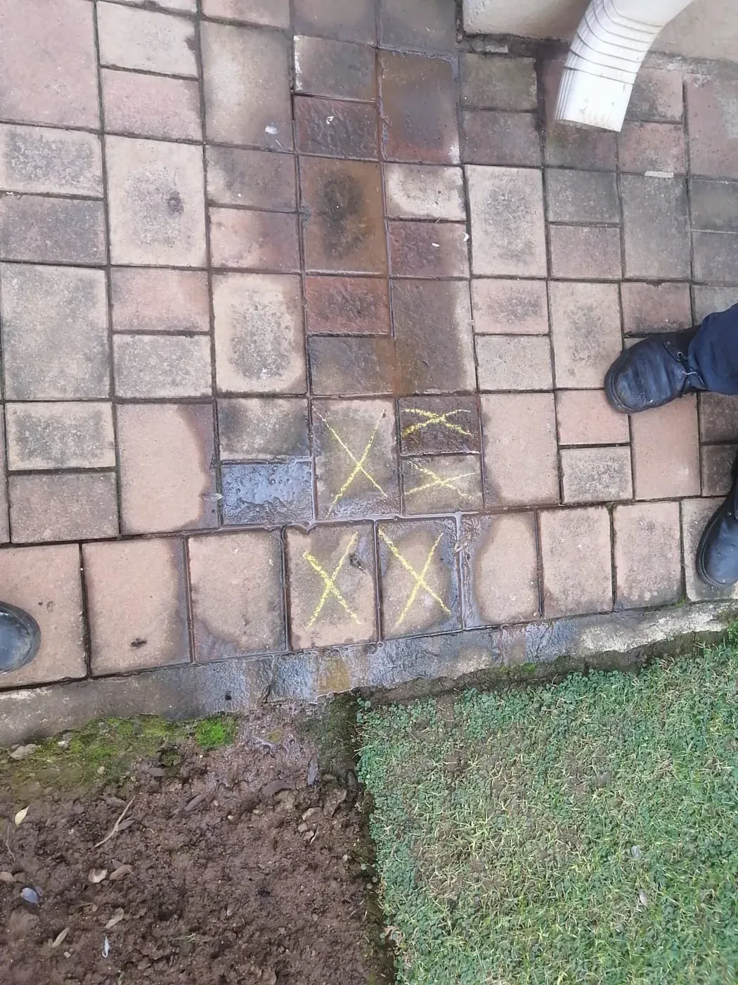 Damp wall cracking caused by moisture from a hidden plumbing leak