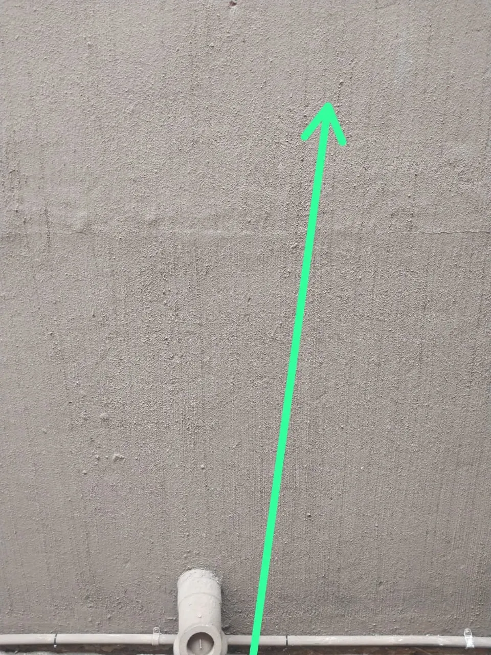 Marked paving showing the narrowed investigation area for a hidden leak